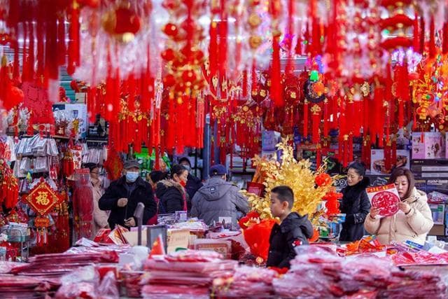 融汇传统与“新”意 年货经济带动节前消费市场供需两旺