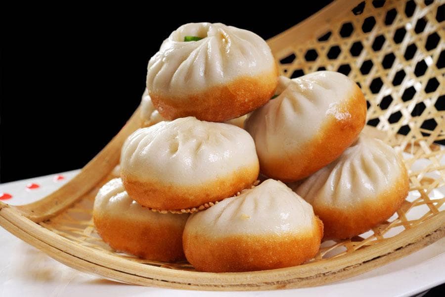 沪上珍馐：探寻上海生煎包，品味魔都街头的鲜香酥脆