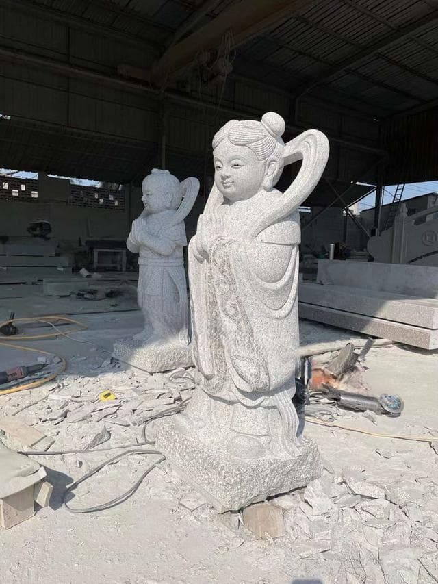 观音菩萨旁的守护：石雕金童玉女的宗教意义（多图欣赏）