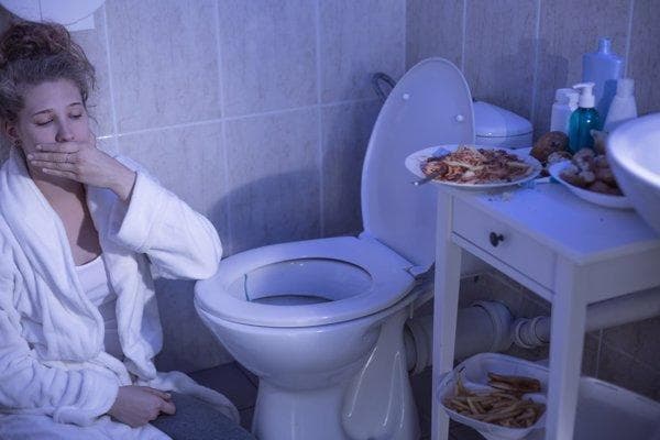 干呕恶心反胃吐不出来挂什么科