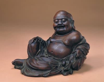 中国木雕艺术：历史渊源与流派特色