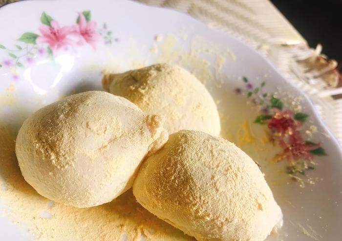 松花汤圆，在金黄的粉穗上打滚儿