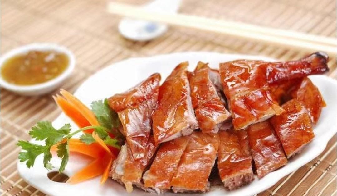 冬日美食地图：从北京烤鸭到东北酸菜白肉锅，品味各地特色暖身美食