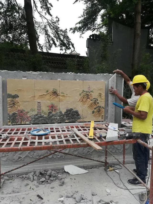 石雕九龙壁的历史故事