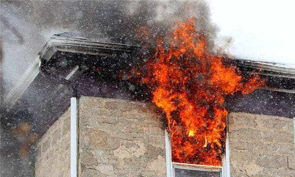 梦到自己家房子着火了是什么意思