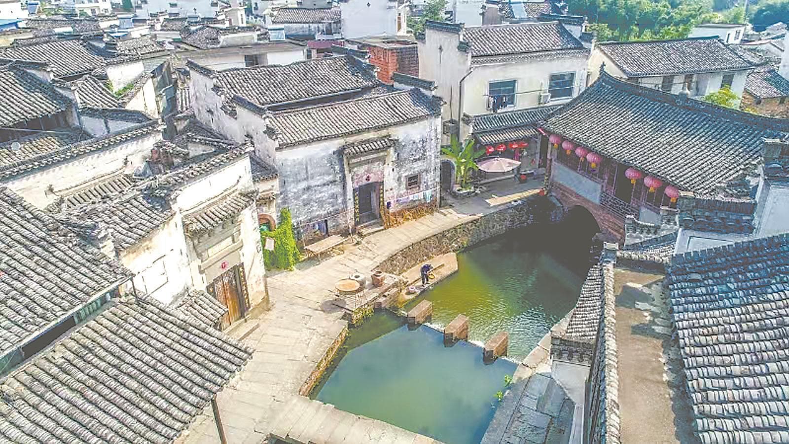 文化中国行 | 堨坝“徽州智慧”流淌千年