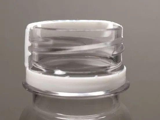 饮料瓶拧上瓶盖后是如何防止漏水的？