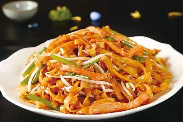 广州干炒牛河：从街头小吃到“全球美食冠军”的传奇故事