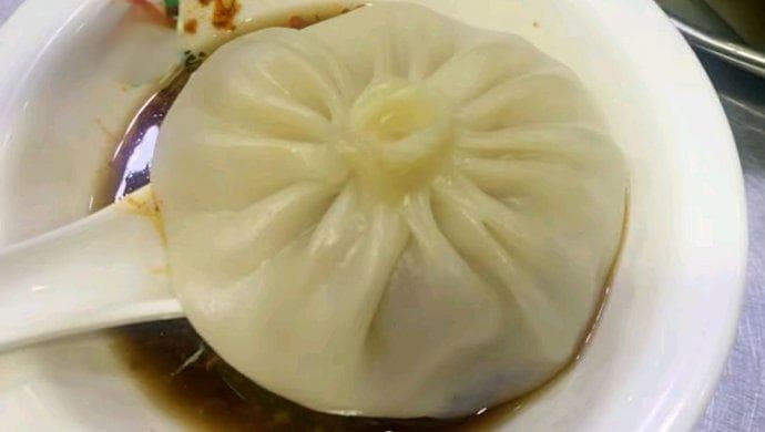 贾三灌汤包的做法与历史渊源