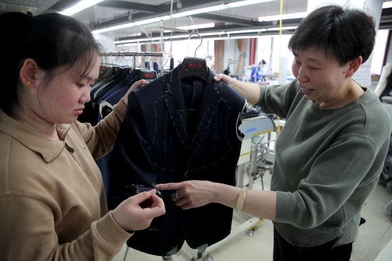 百年服装老字号红都追“新”记