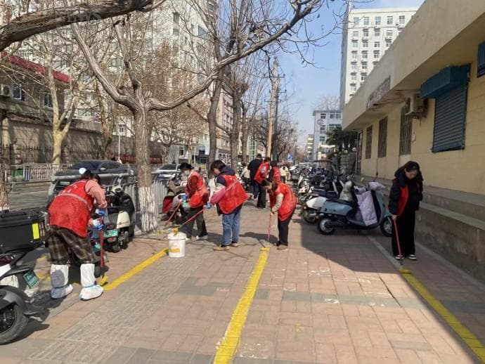 共绘文明线 康复社区推动非机动车规范停车