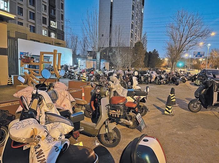电动车进小区不能“一禁了之”