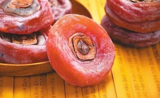 答疑解惑：警惕人工撒粉充当柿饼白霜