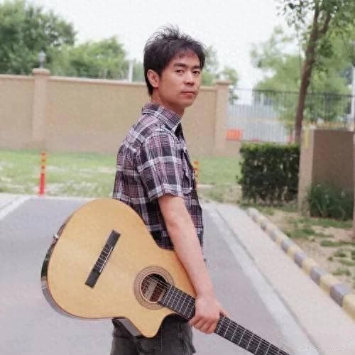 马健涛用音乐托起时代温度