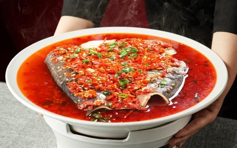 春节非遗美食丨剁椒鱼头上桌，湖南人的春节年味来了