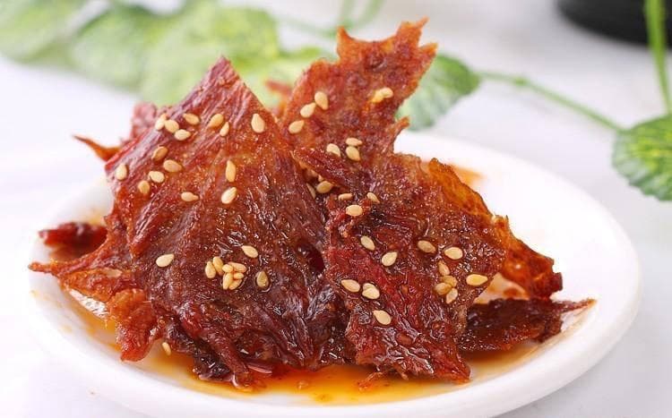 探寻灯影牛肉的百年风味
