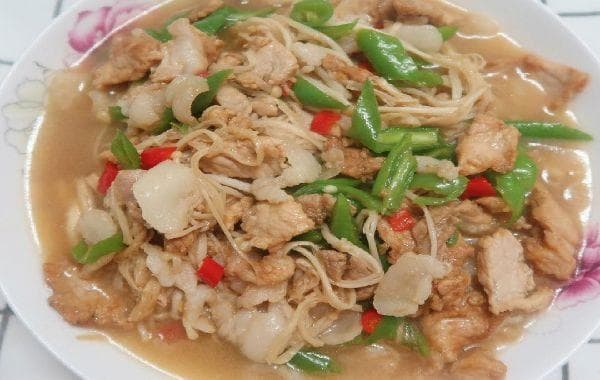 家常美味金针菇炒猪肉丝：营养搭配与烹饪技巧全解
