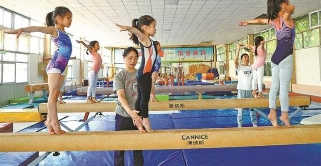 为厦门培养出虞琳敏、褚一鸣等体操冠军，这对夫妻档教练有啥“育苗密码”？