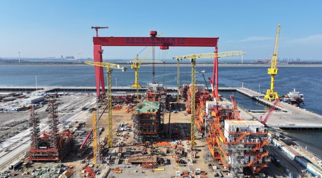 变"通道经济"为"港口经济"——天津做强港口关联产业观察