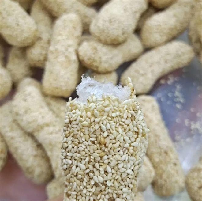 舌尖上的河源：料花与蛋卷的制作方法，传统美食的魅力与传承！