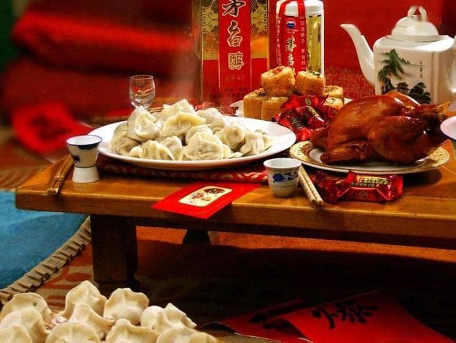 南北方春节习俗大不同：饺子配春晚 vs 汤圆配庙会