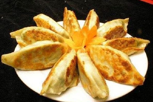 中国十大特色饺子排行榜：从上海锅贴到四川鸳鸯饺