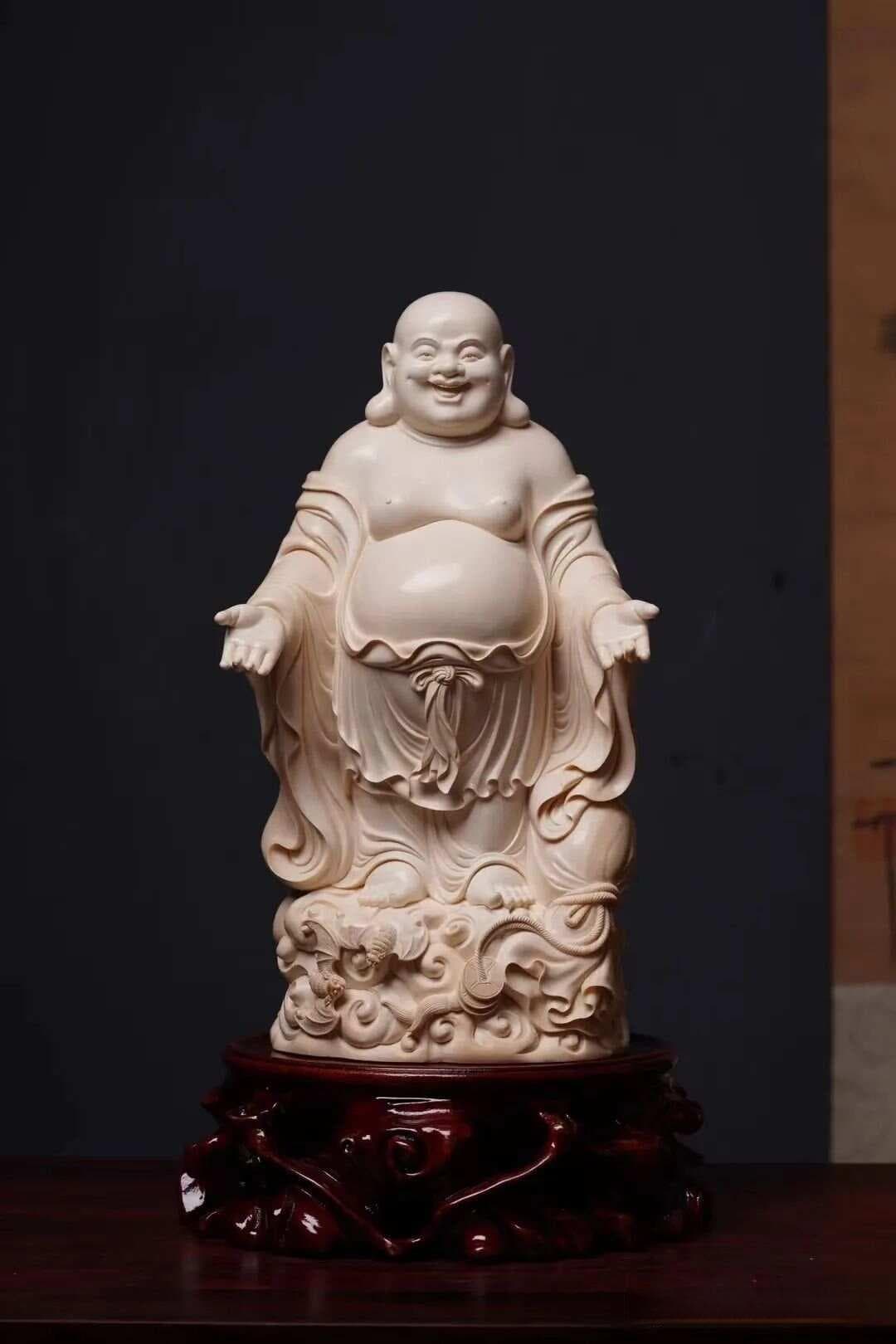 “皆大欢喜”：猛犸牙雕弥勒佛的艺术价值与文化内涵