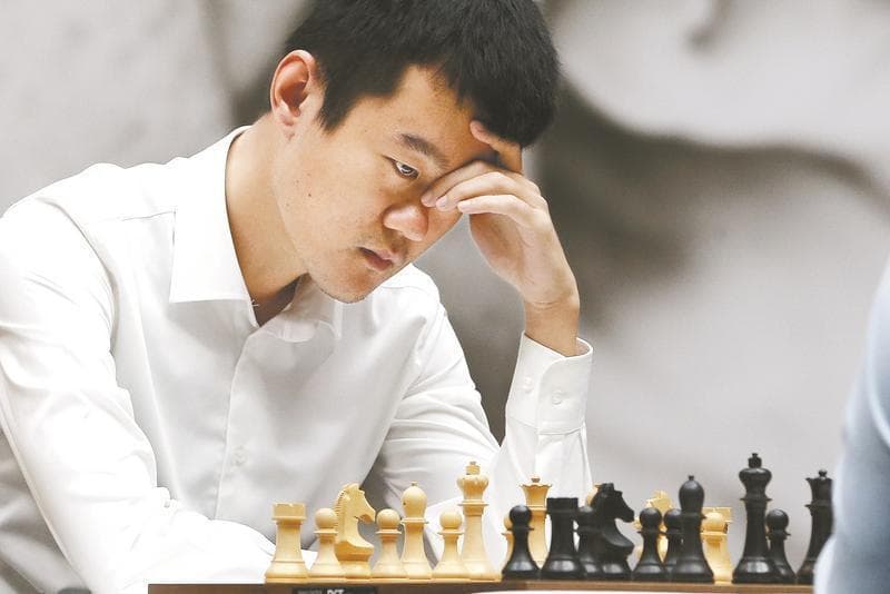 【周末特稿】中国首位“世界棋王”丁立人低谷中踏上卫冕之旅