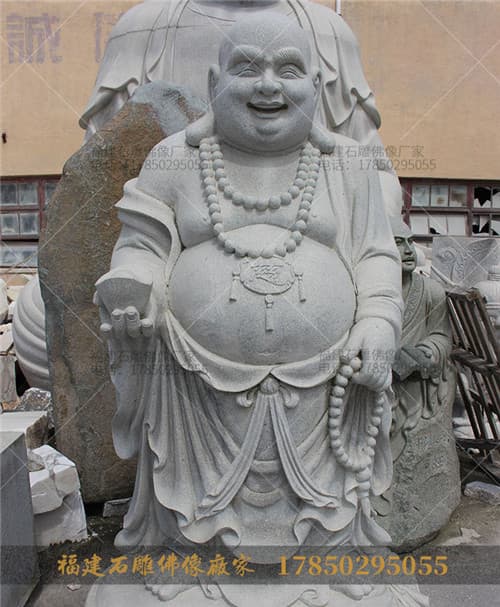 石雕弥勒佛耳垂为什么这么大？