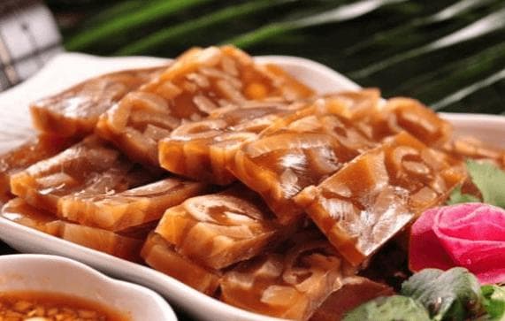 猪头焖子制作全攻略：传统美味与创新烹饪的完美结合