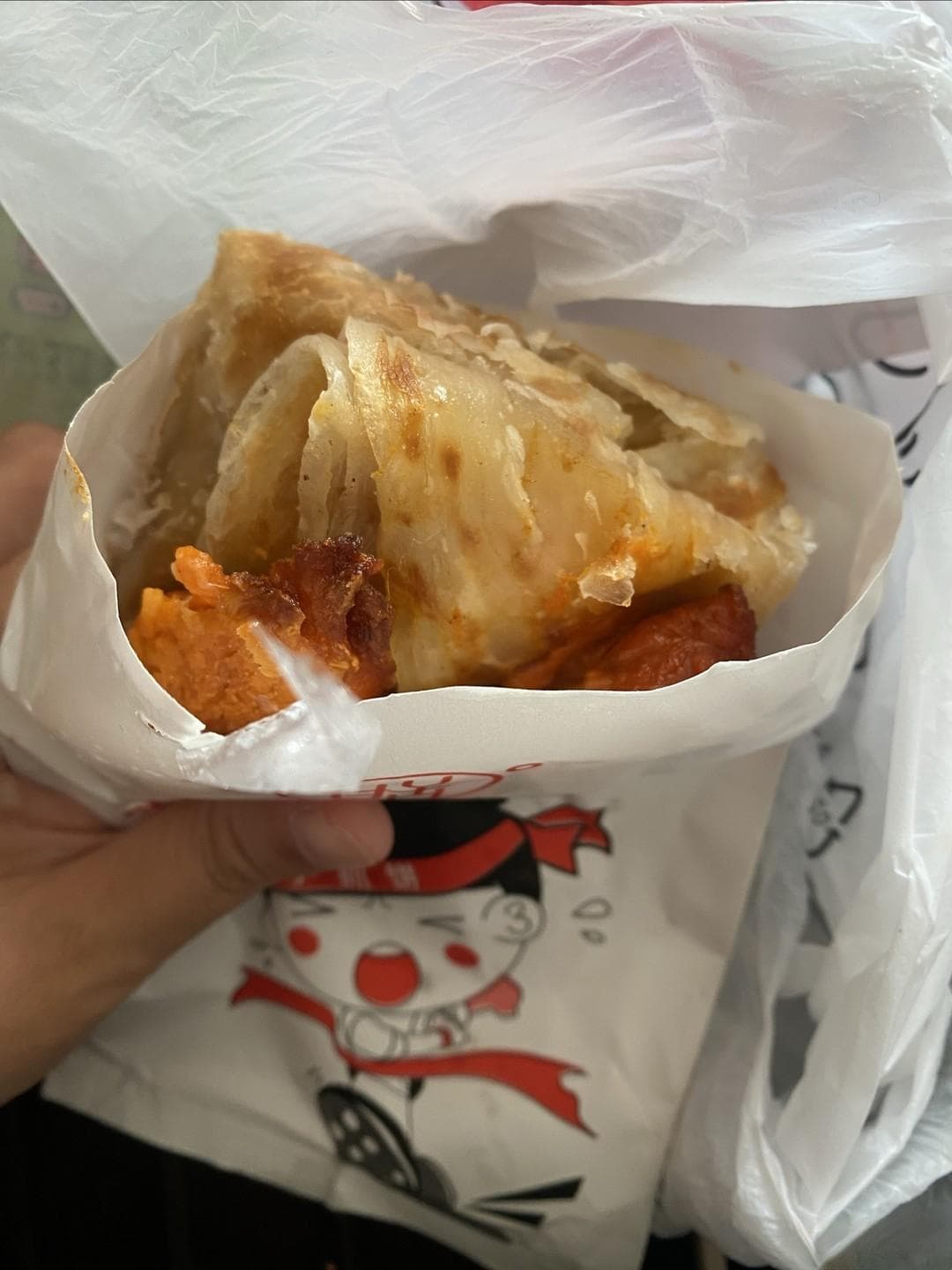 手抓饼：街头巷尾的美味传奇