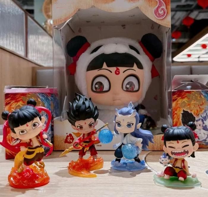 春节档大卖开局！《哪吒2》周边烫手，商业浓度还看《封神》