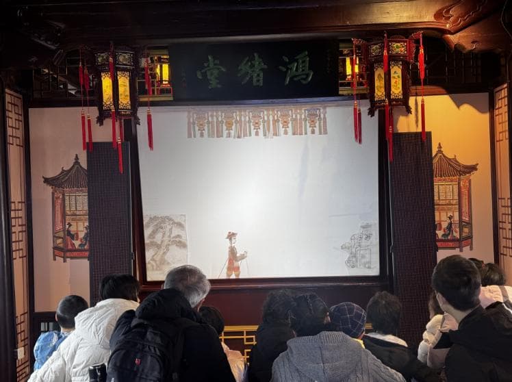 赏十锦细锣鼓、看皮影戏……他们在泗泾古镇玩转首个“非遗”春节