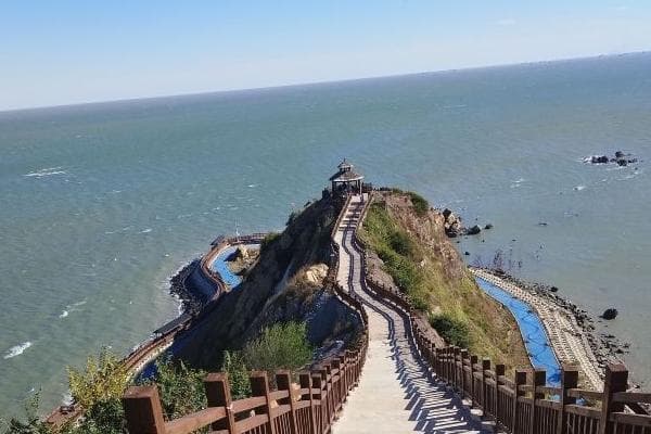 潮起潮落现天桥，笔架山岛藏500年古刹