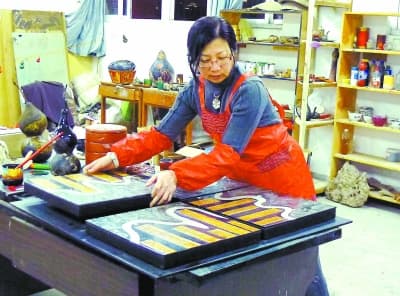 音符与色彩的美妙交融：武夏红的“另类”漆画艺术