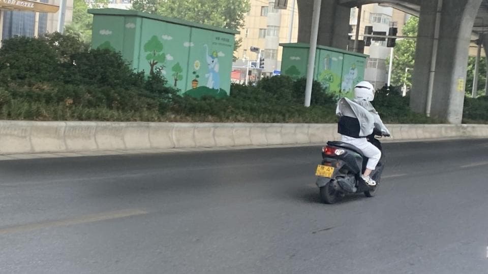 郑州专项治理摩托车突出交通违法行为，“能否取消禁摩”再次引关注