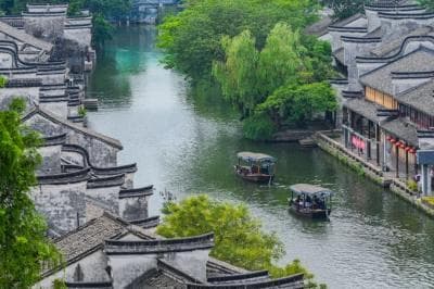 南浔百间楼的两则传说：“洗粉花香”与“煤山望月”