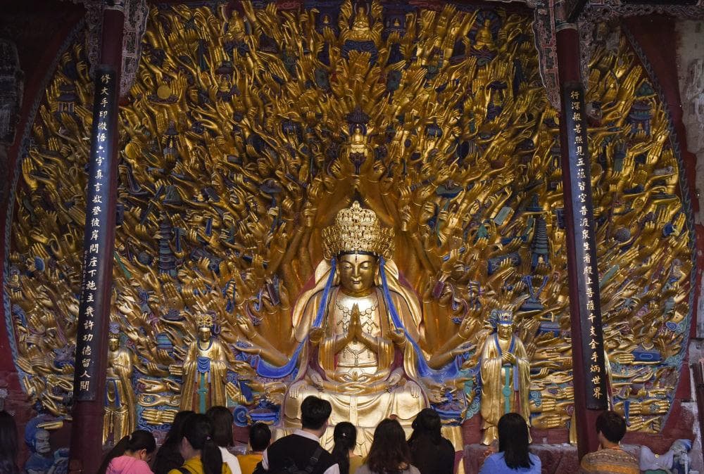 梁思成发现大足石刻84年：从荒野遗珠到世界文化遗产