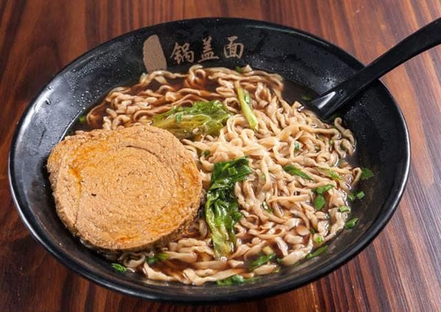 镇江六大特产：从水晶肴肉到金山翠芽，品味地道风味