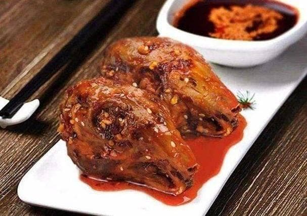 辣出新高度，四川老妈兔头：舌尖上的麻辣艺术