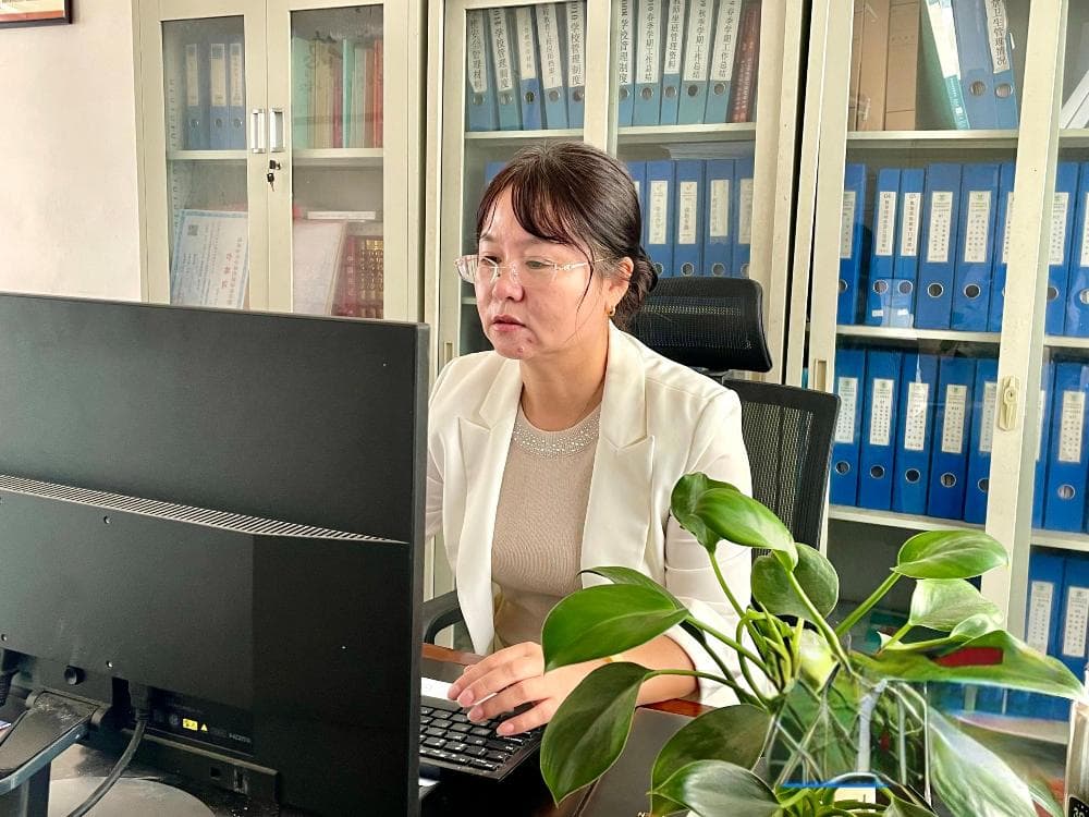 昌江乌烈镇学校校长金艳：用心打造“有温度的教育”