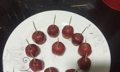 圣女果冰糖葫芦——做法详解（手把手教你制作美味可口的圣女果冰糖葫芦）