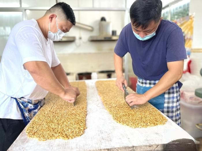 广东侨乡信宜百年古制法花生糖：游子梦乡里的甜蜜