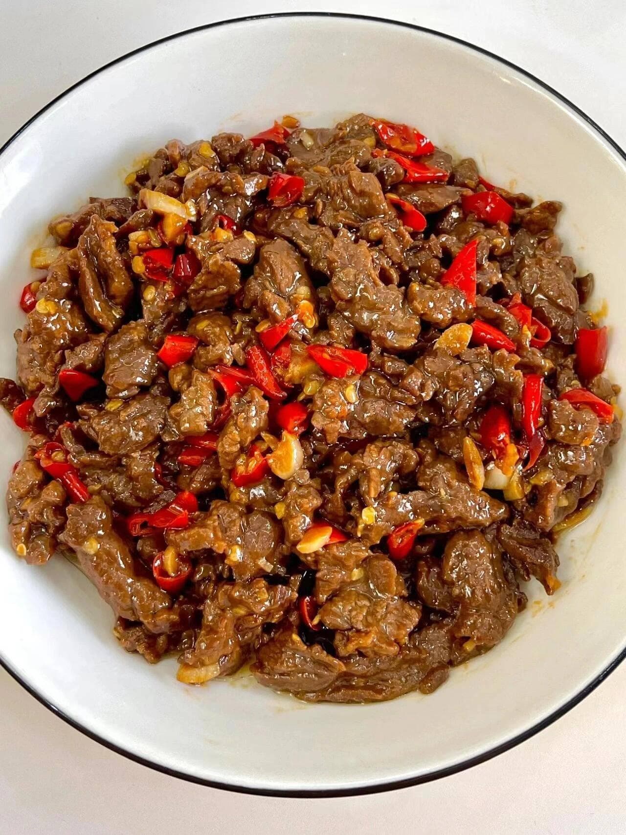 小炒碎牛肉怎么做才能让家人满意？