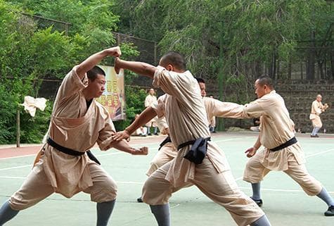 从唐代僧兵到国际使者：少林寺武僧团的历史演变