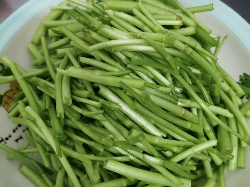 黎蒿炒腊肉：一道香醇可口的家常菜