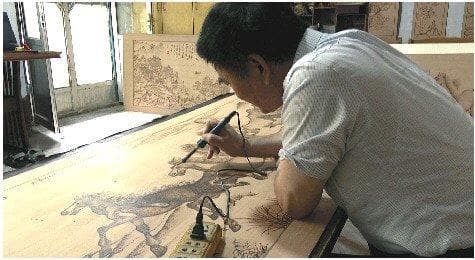 梅氏烙画：火与木的艺术