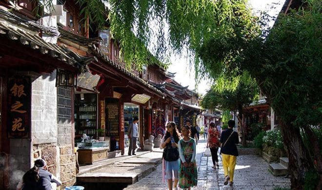 丽江古城和大理古城，哪个更值得去？