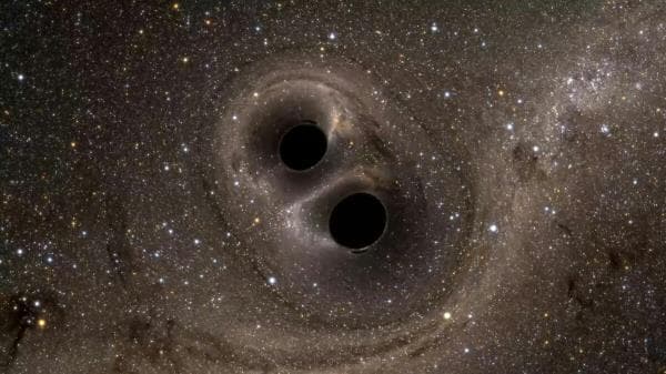 一些位于星系中心的黑洞有一个伙伴，但探测到这些双星并不容易