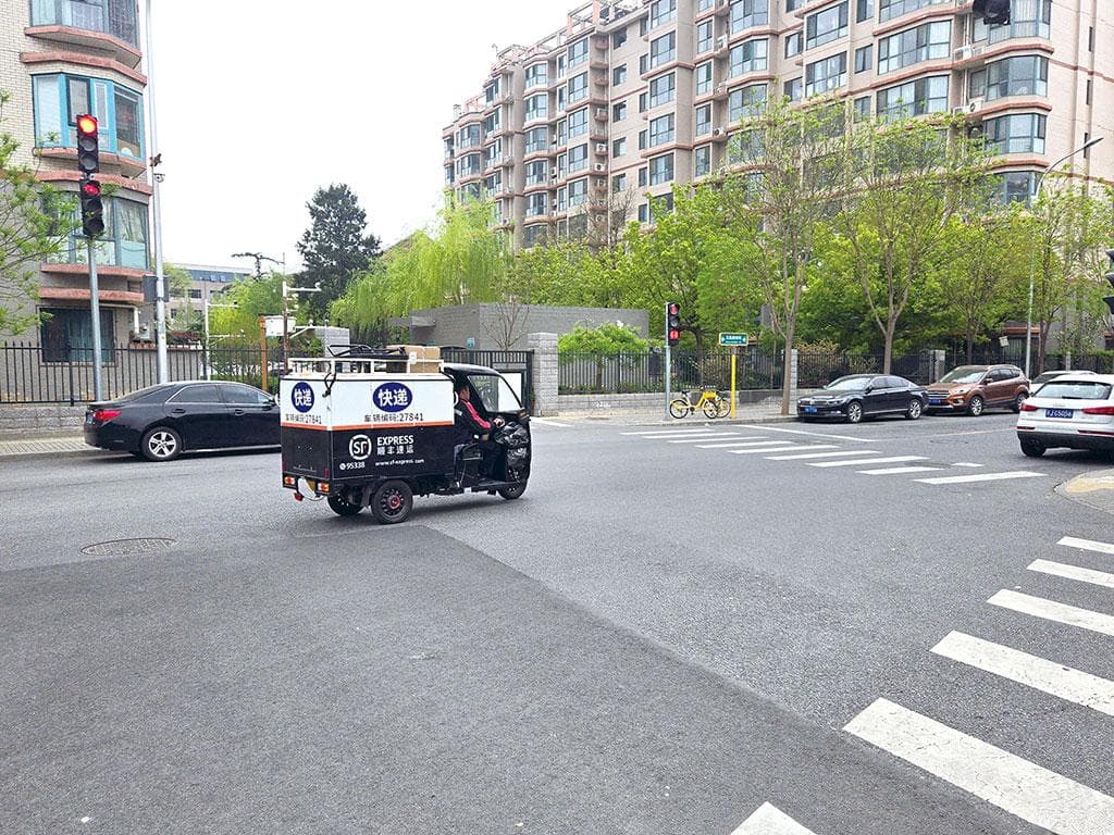 跟着小哥送快递——《快递市场管理办法》实施一个多月快递服务一线直击